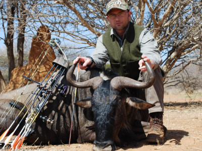 Author Steven M. Kendus with South African blue wildebeest