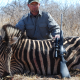 Author Steven M. Kendus with South African Zebra Stallion